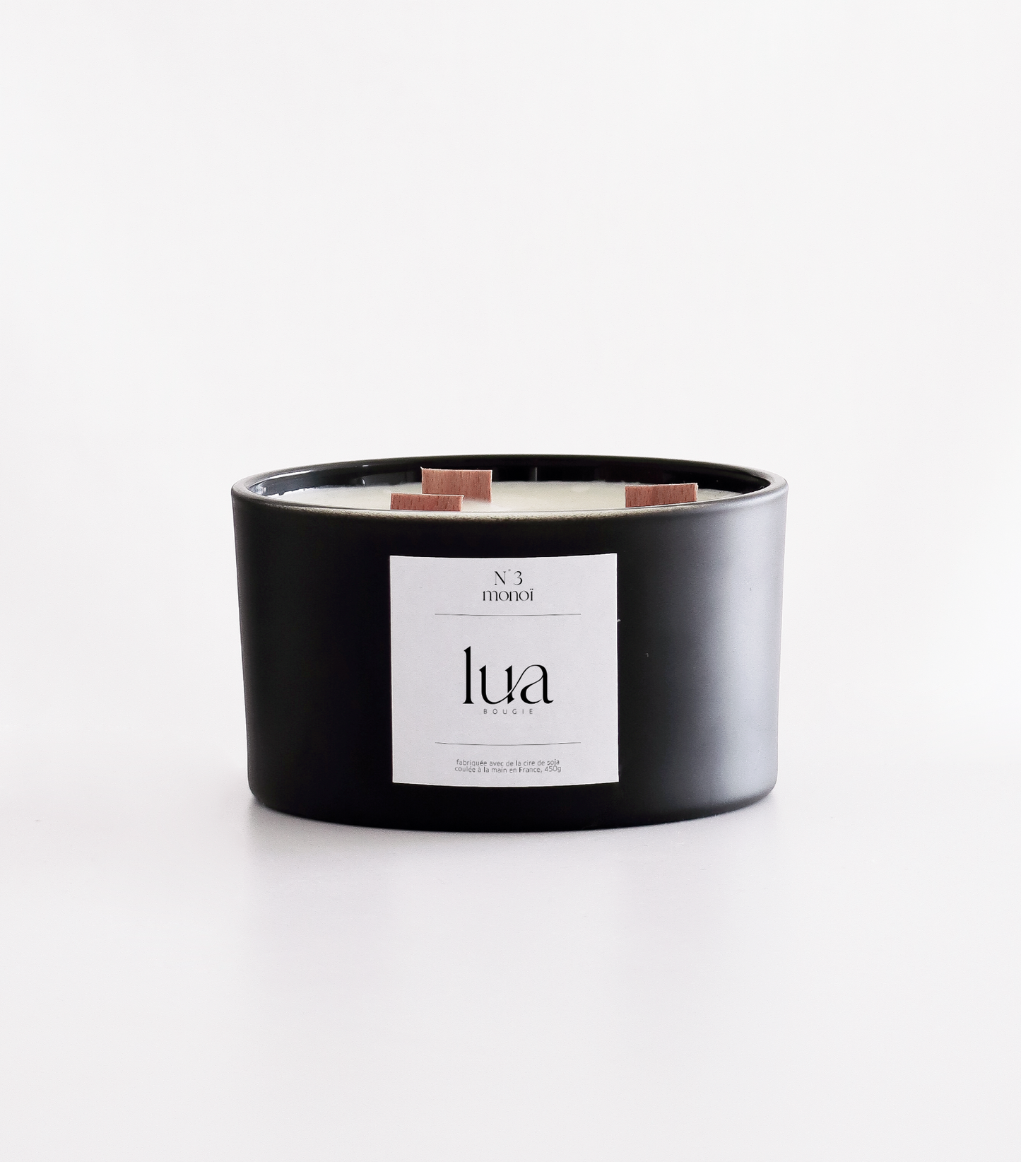 Bougie Lua personnalisables et rechargeables, parfums monoï, contenant noir 450g. 